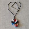 Colgante con piedra y hombrecito ceramico